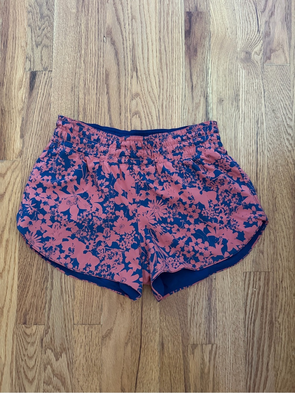 lululemon athletica Women's Coral Floral Running Shorts on Navy